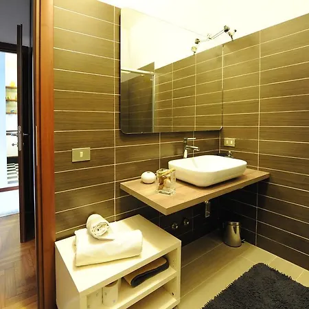 アパート Suites & Design